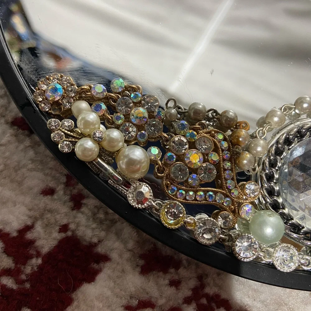 Hand Jeweled Mirror. Measurers Approximately 10 inches.